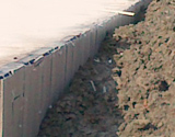 Extruded board for soil filling